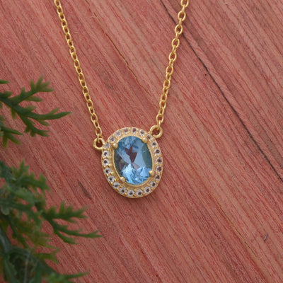 Blue Topaz Oval Halo Silver Necklace